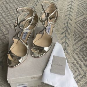 JIMMY CHOO
Lang 100 mirrored-leather sandals